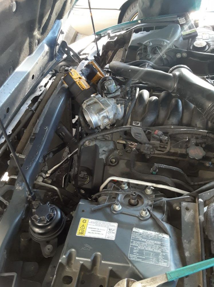 Under-hood work at a Derby address near Wichita